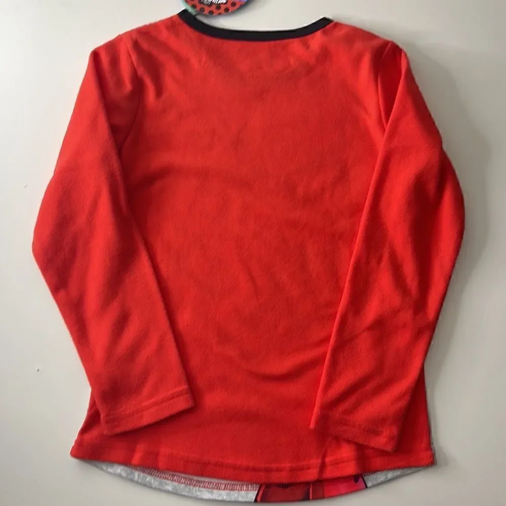 NWT Zag heroe z Miraculous pajama shirt.  Size M.  Size (7-8).